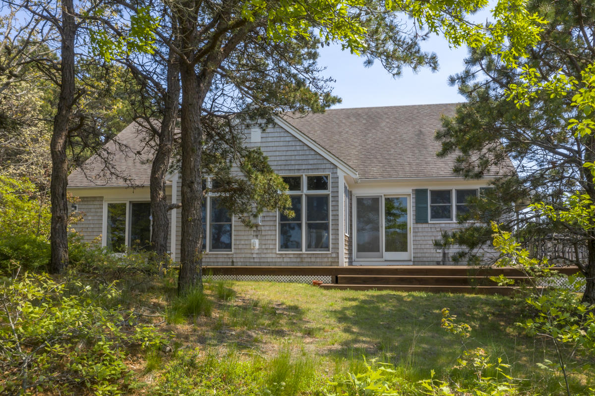 51 Depot Road Truro, MA 02666 - Photo 3 of 24 a house view with a garden space