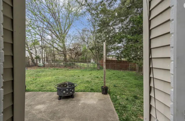 a backyard of a house with lots of green space