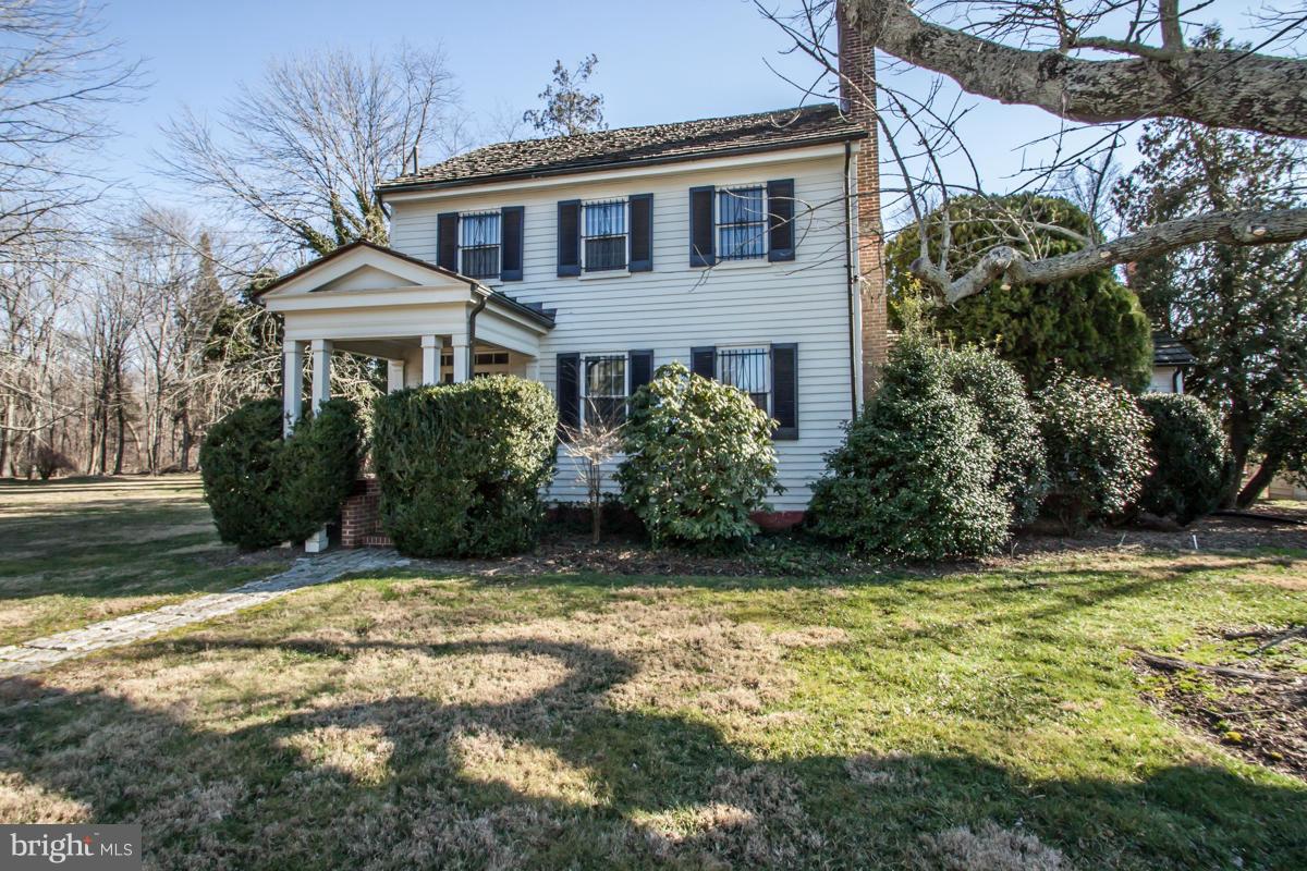 315 Farmhouse Road Accokeek, MD 20607 - Photo 1 of 30 a view of a house with a garden