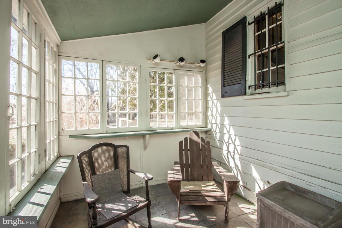 315 Farmhouse Road Accokeek, MD 20607 - Photo 15 of 30 a view of a chair and table in a patio