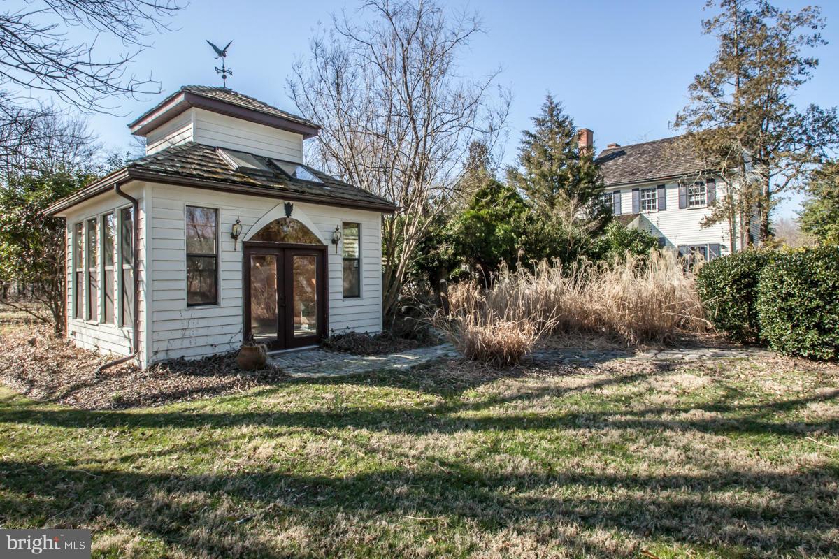 315 Farmhouse Road Accokeek, MD 20607 - Photo 22 of 30 a front view of a house with a yard