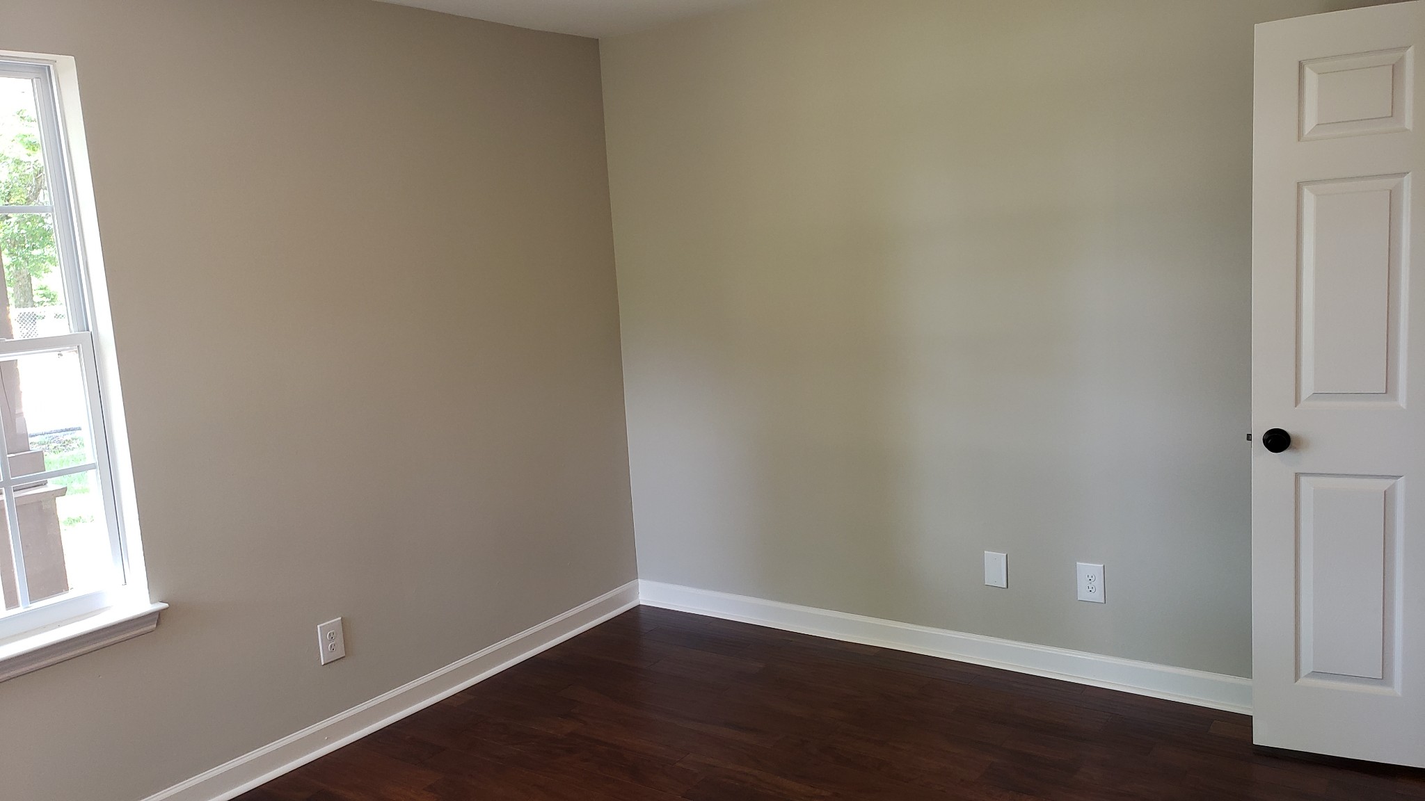 1103 Hickory Ridge Road Lebanon, TN 37087 - Photo 9 of 9 a view of an empty room with wooden floor and a window