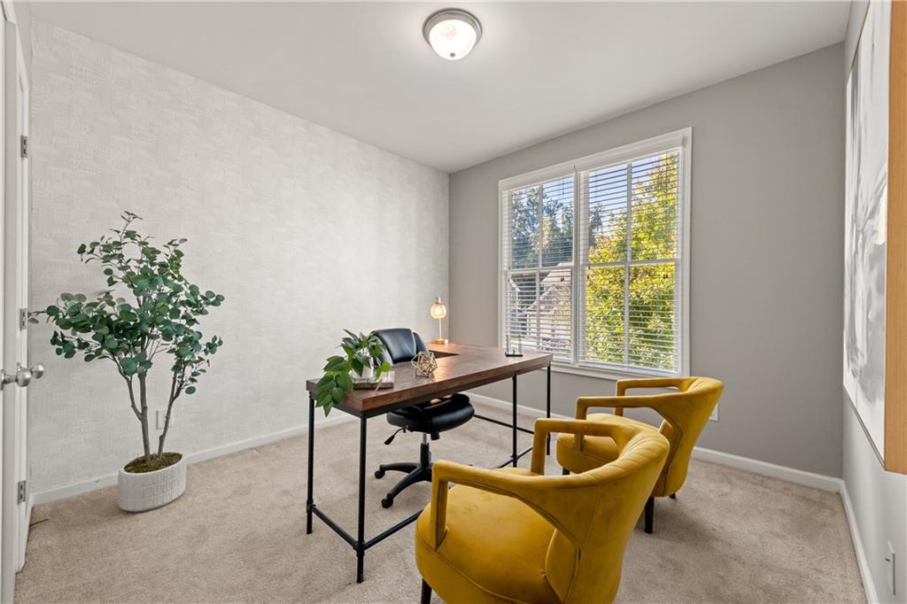 2199 Collins Ridge Drive Northwest Atlanta, GA 30318 - Photo 31 of 50 a living room with furniture and a potted plant