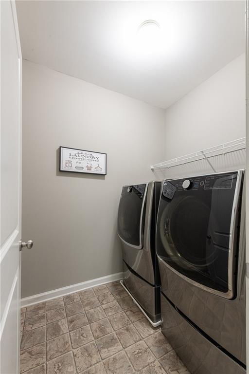 2199 Collins Ridge Drive Northwest Atlanta, GA 30318 - Photo 32 of 50 a view of a utility room with washer and dryer