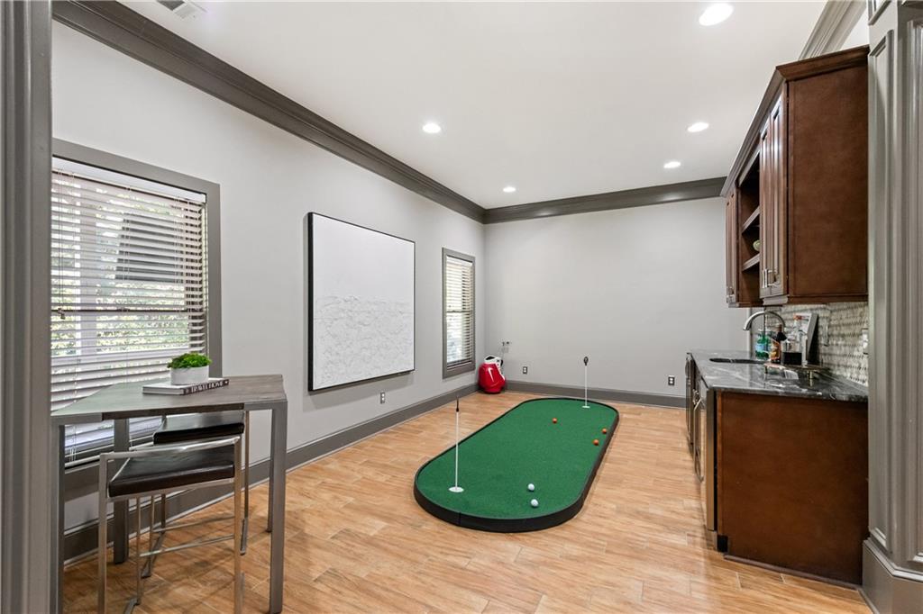 2199 Collins Ridge Drive Northwest Atlanta, GA 30318 - Photo 35 of 50 a room with pool table and windows