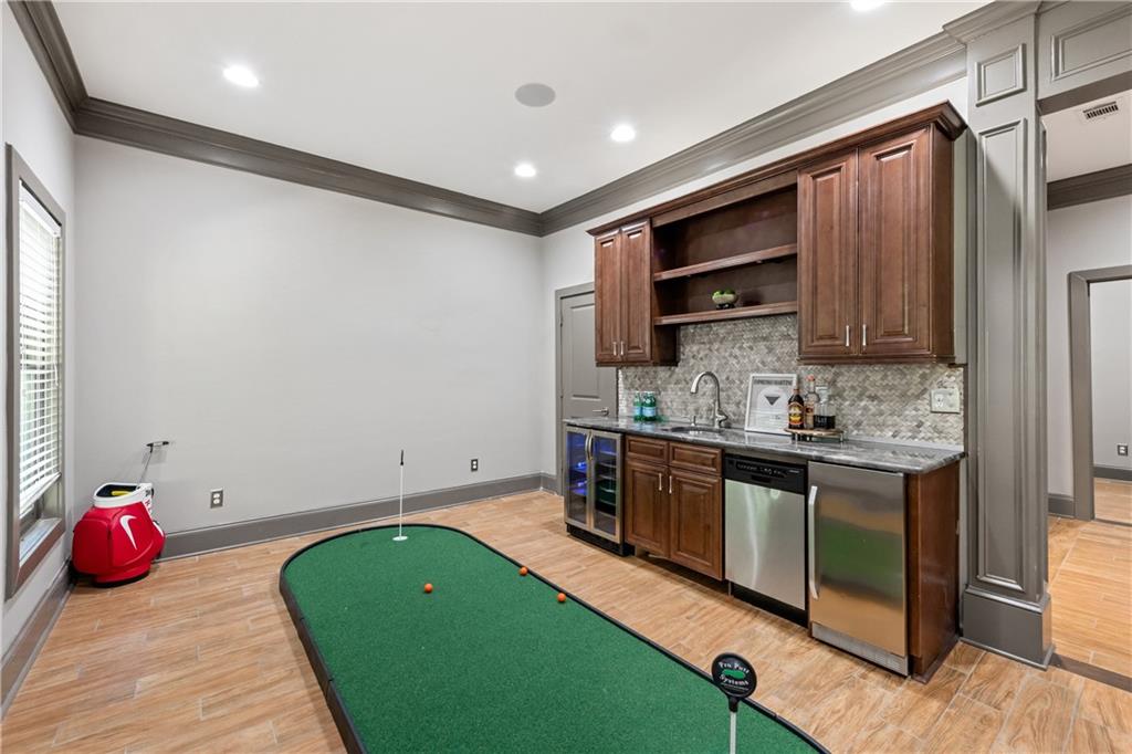 2199 Collins Ridge Drive Northwest Atlanta, GA 30318 - Photo 36 of 50 a kitchen with a sink cabinets and window