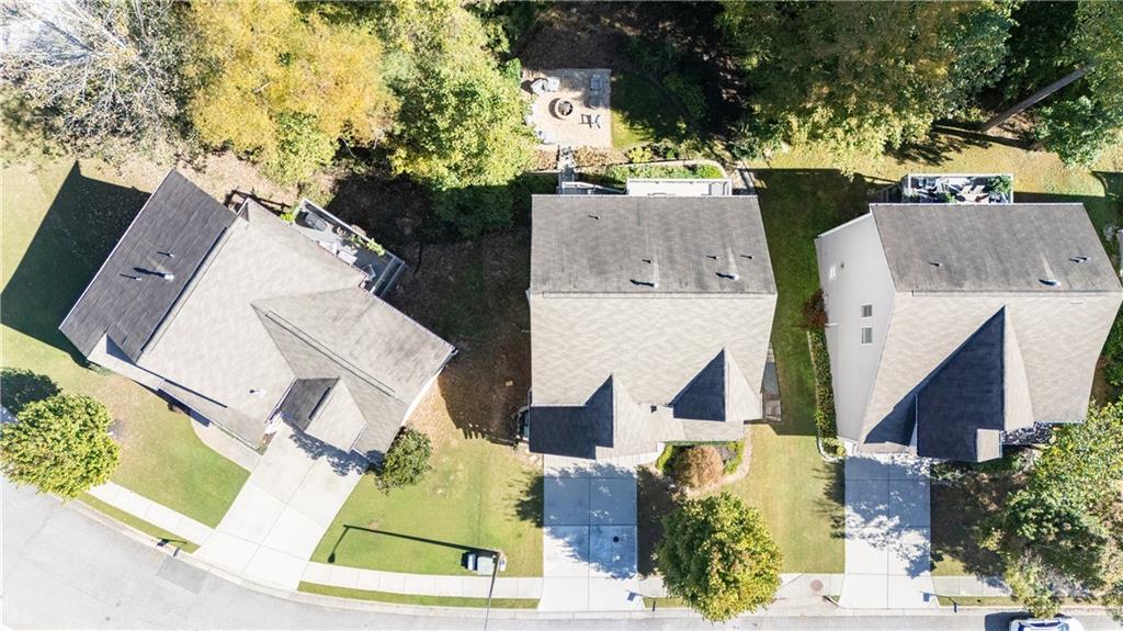 2199 Collins Ridge Drive Northwest Atlanta, GA 30318 - Photo 49 of 50 an aerial view of residential houses with outdoor space and parking