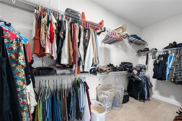 a view of a white cabinets and wooden floor