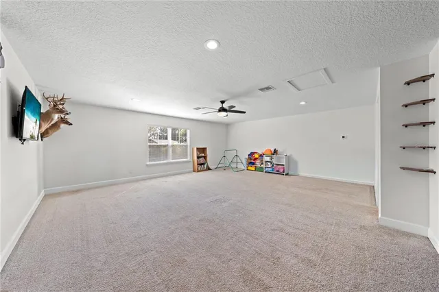 a view of swimming pool with a sitting space