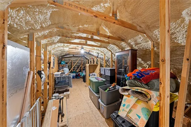 a view of a backyard with large trees