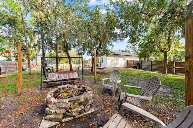 a view of house with a entertaining space and a view of house