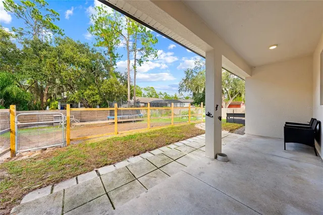 a view of lake with green space