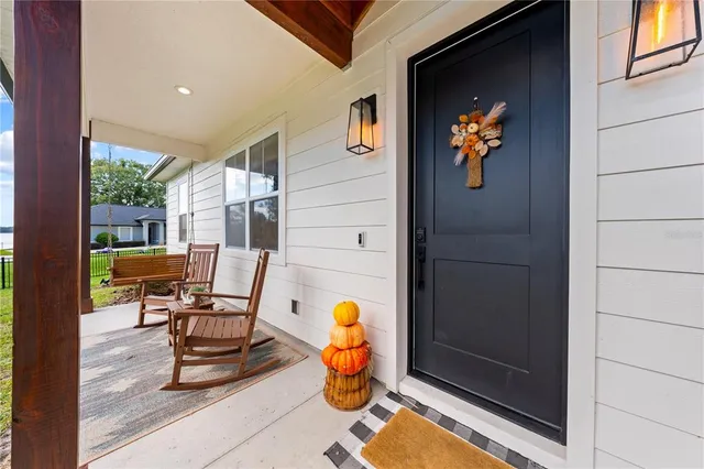a view of living room with porch and furniture