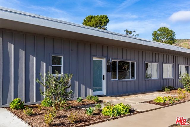 a front view of a house having yard