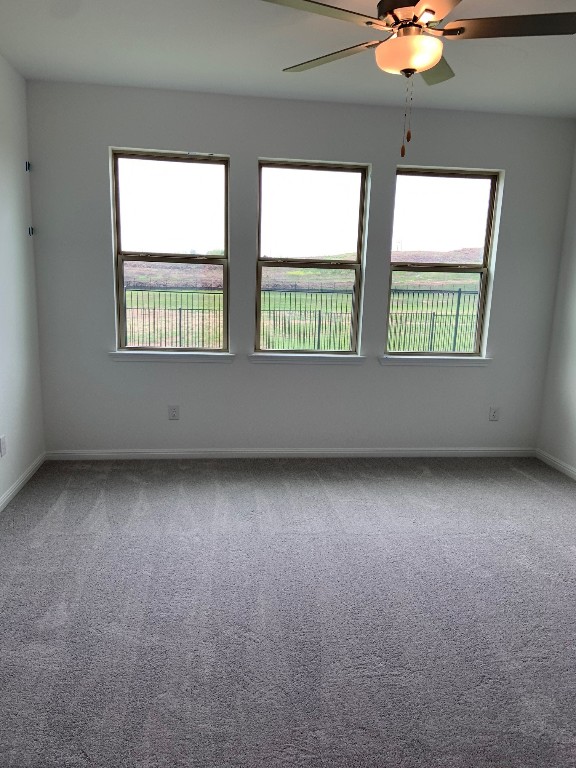 152 Lime Street Buda, TX 78610 - Photo 16 of 32 an empty room with a window