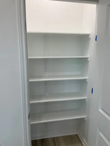 an empty room with a workbench