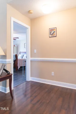 a view of a livingroom with wooden floor