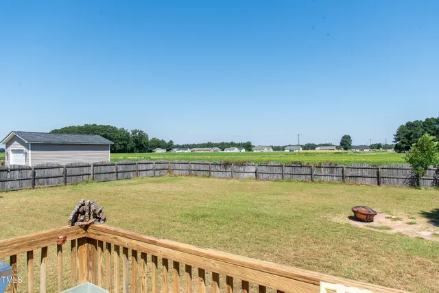 a view of a swimming pool with an ocean view