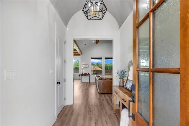 a view of living room filled with furniture and window