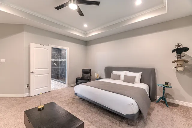a bathroom with a sink mirror and a shower