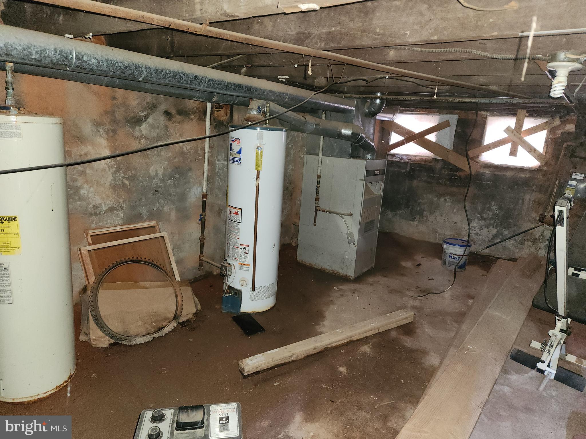 1719 Baker Street Baltimore, MD 21217 - Photo 14 of 16 a bathroom with a sink and a mirror