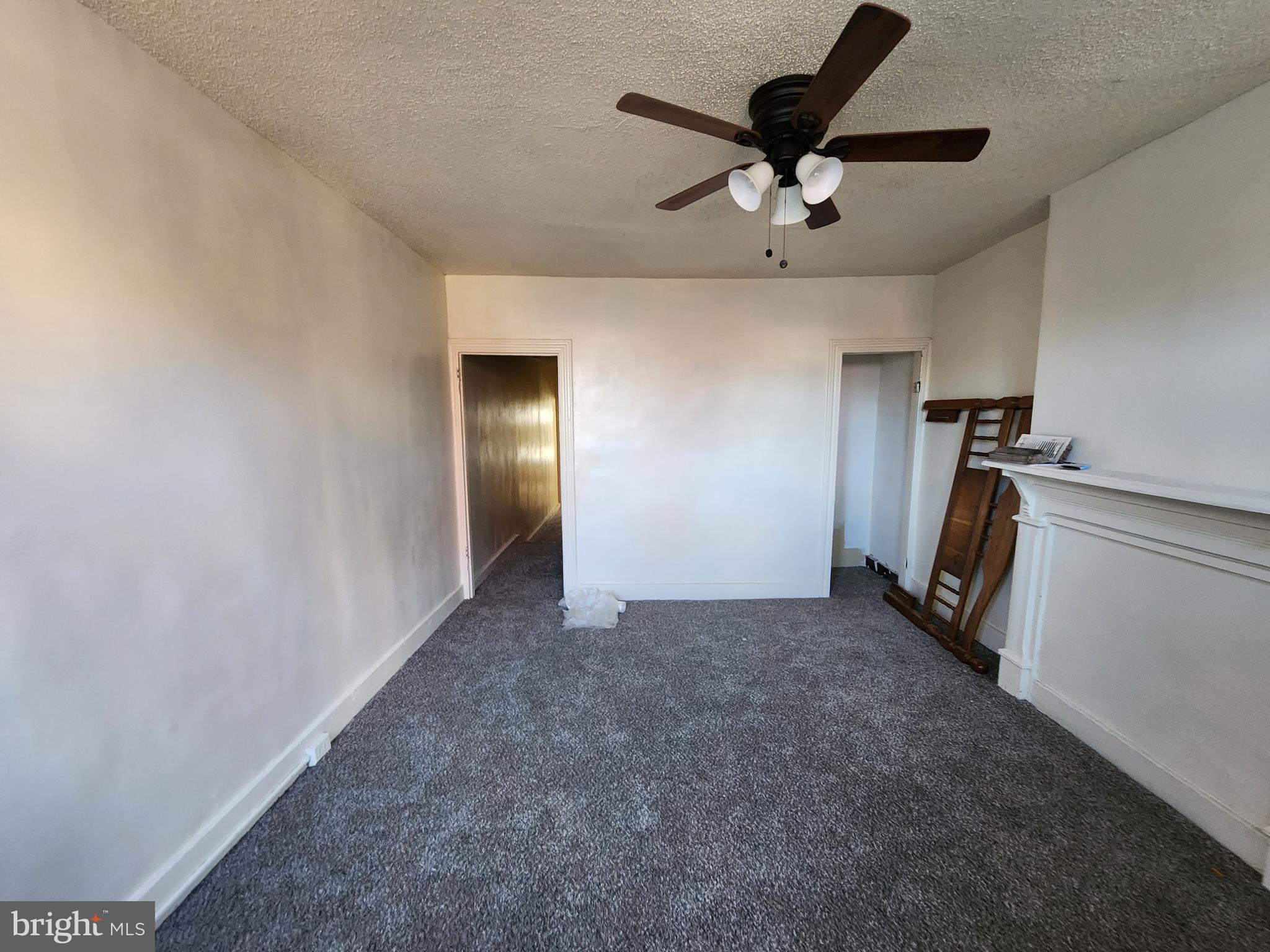 1719 Baker Street Baltimore, MD 21217 - Photo 9 of 16 a view of empty room with ceiling fan