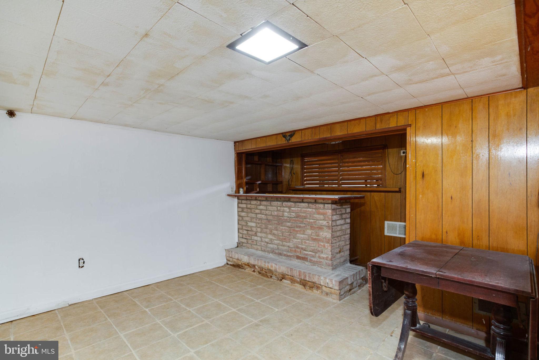 7841 Clark Station Road Severn, MD 21144 - Photo 27 of 46 Basement with Bar Area