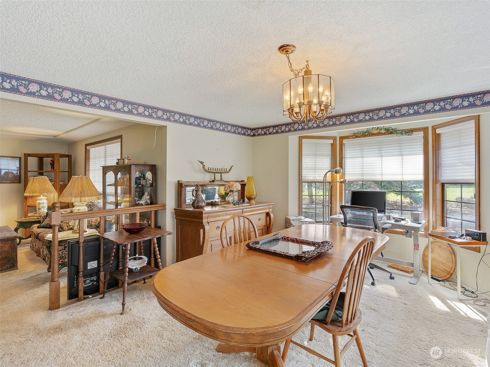 5814 Northwest 169th Street Ridgefield, WA 98642 - Photo 14 of 40 a view of a dining room with furniture window and outside view