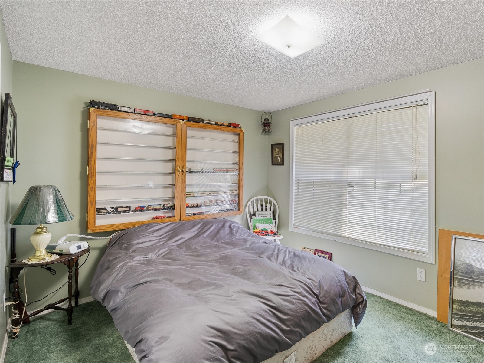 5814 Northwest 169th Street Ridgefield, WA 98642 - Photo 23 of 40 a bedroom with bed and a window
