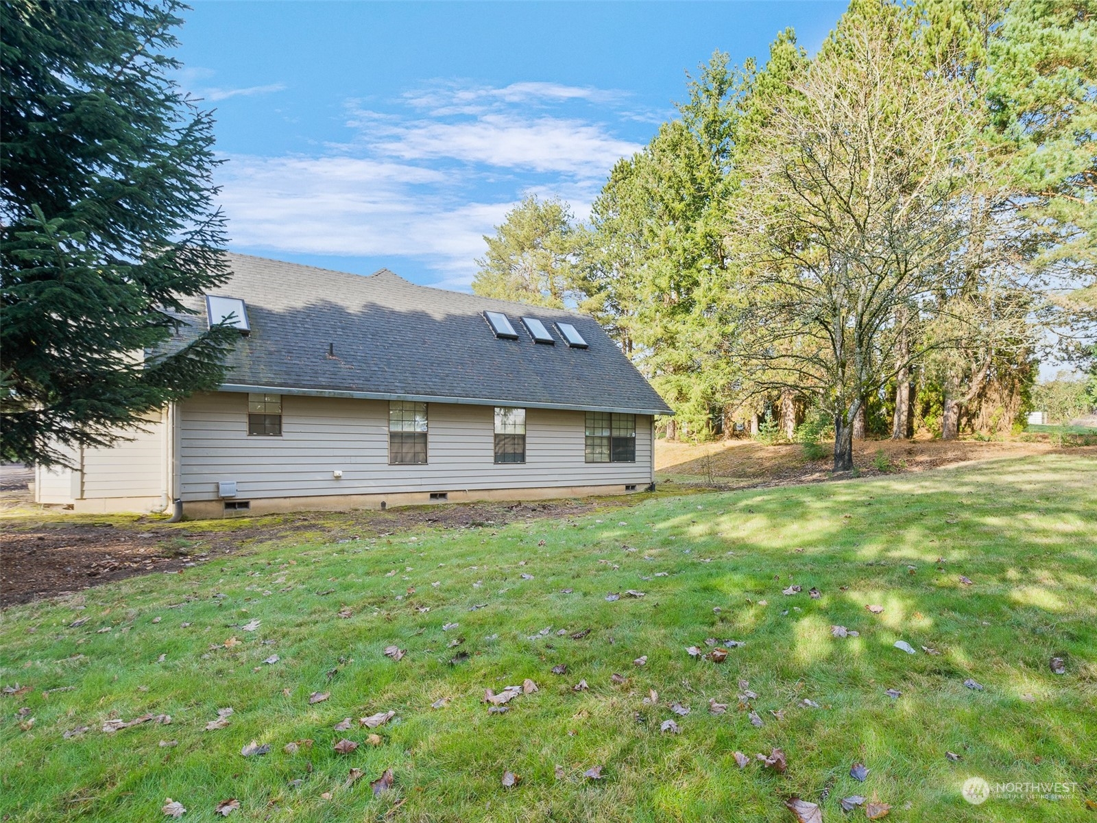5814 Northwest 169th Street Ridgefield, WA 98642 - Photo 28 of 40 a front view of a house with yard and green space