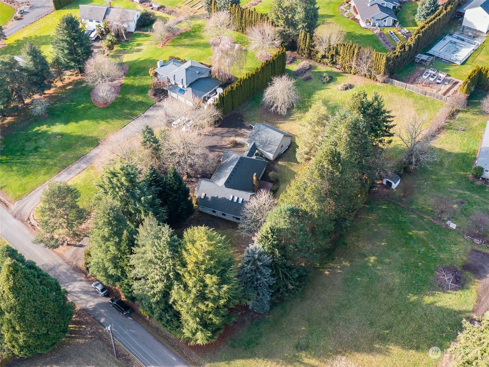 5814 Northwest 169th Street Ridgefield, WA 98642 - Photo 40 of 40 an aerial view of a house with a yard basket ball court and outdoor seating