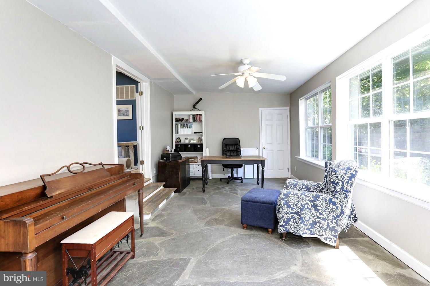 1885 Severn Grove Road Annapolis, MD 21401 - Photo 13 of 30 Sunken Sunroom with Native Stone Floor