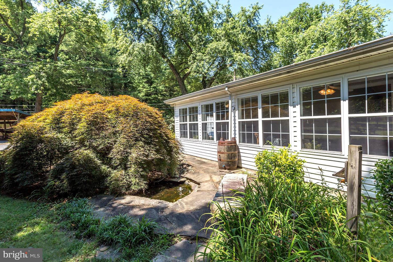 1885 Severn Grove Road Annapolis, MD 21401 - Photo 15 of 30 Verdant Views of the Outdoor Patio and Lawns