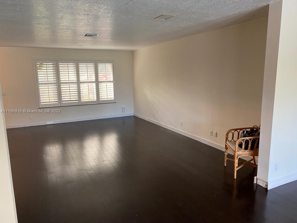 8425 Southwest 185th Street Cutler Bay, FL 33157 - Photo 9 of 17 an empty room with a window