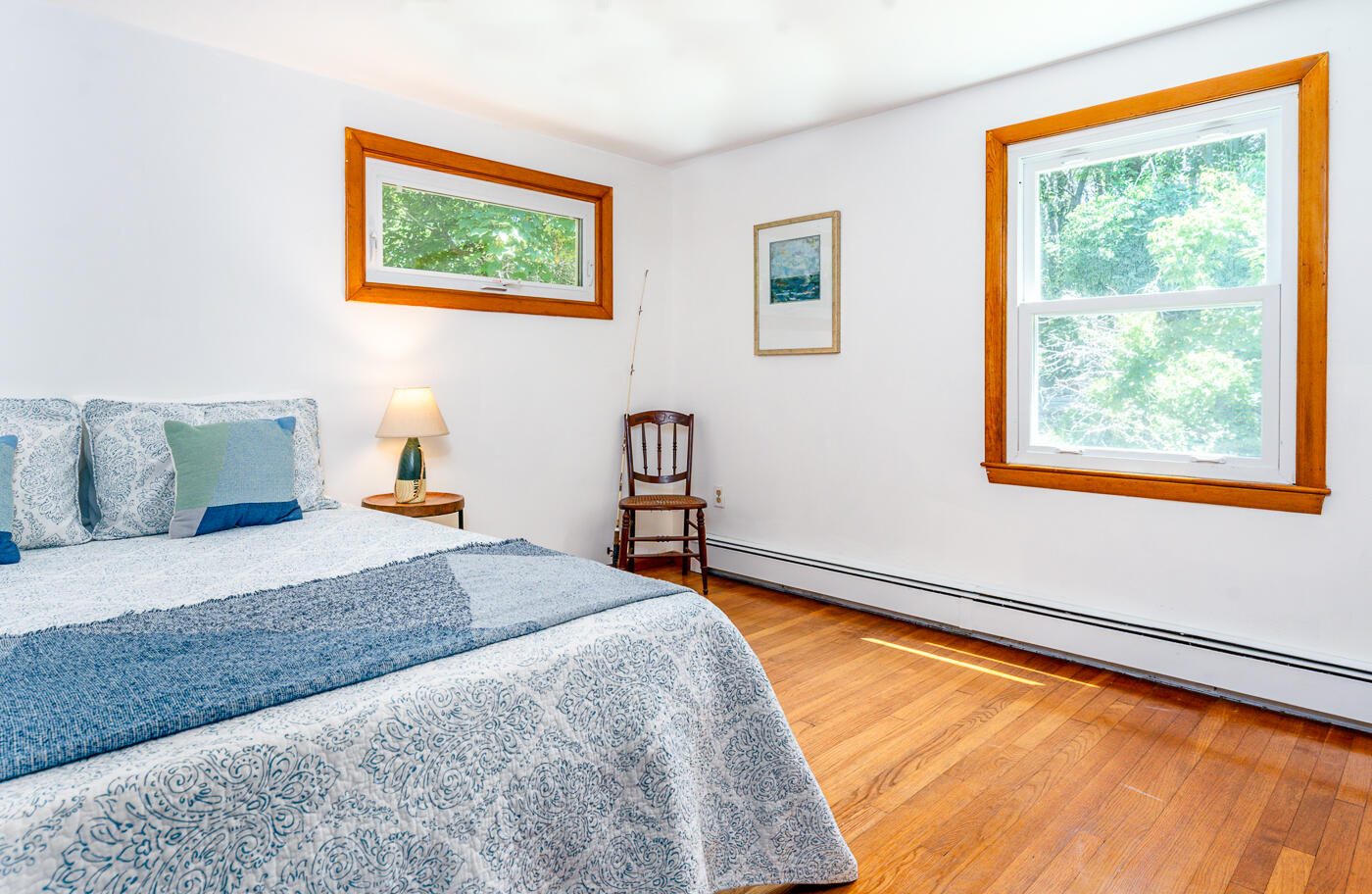 2 Pine Ridge End Truro, MA 02666 - Photo 18 of 31 a bedroom with a bed and wooden floor