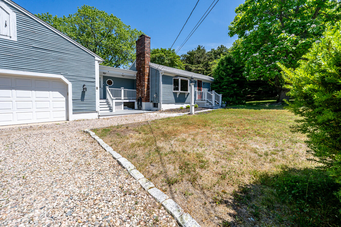 2 Pine Ridge End Truro, MA 02666 - Photo 26 of 31 a house with trees in the background