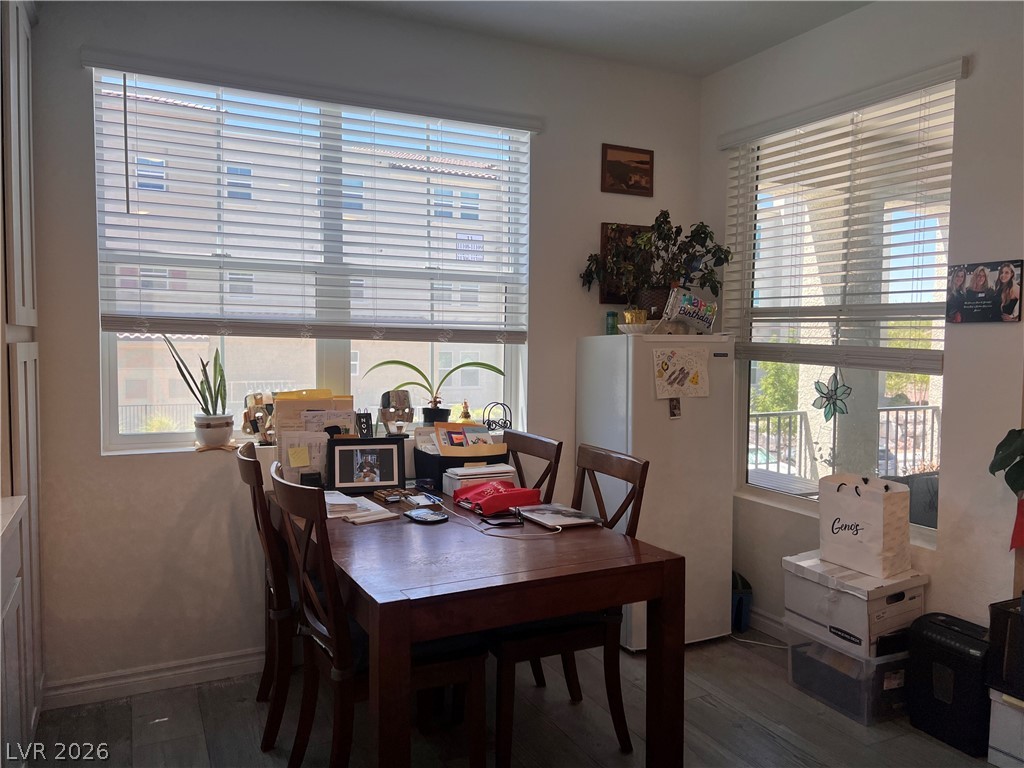 2555 Hampton Road, Unit 2207 Henderson, NV 89052 - Photo 19 of 34 Natural light pours into this functional dining area, offering a comfortable space for everyday meals.