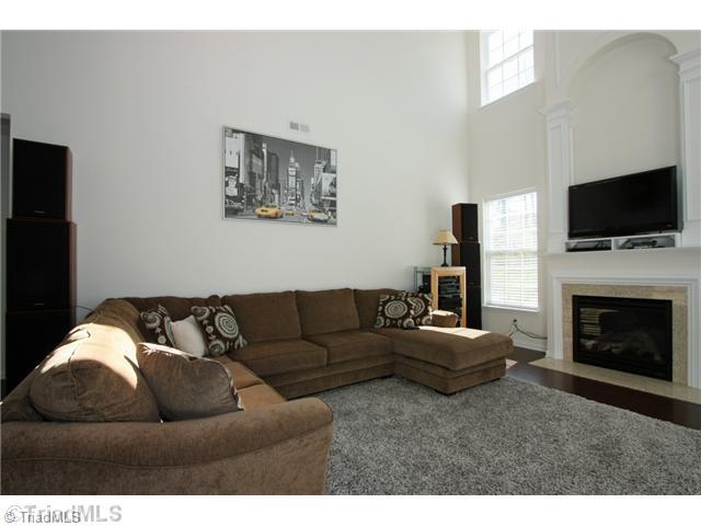 3520 Lamplight Way High Point, NC 27265 - Photo 8 of 16 Living Room. Note high ceilings and fireplace