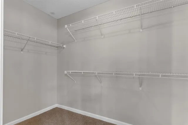 a view of a room with racks on the wall