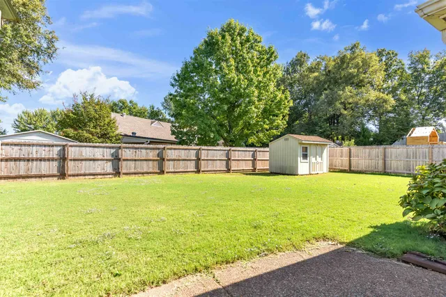 a view of an outdoor space and a yard