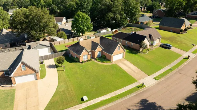 an aerial view of a pool patio swimming pool and outdoor seating