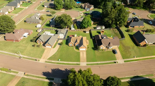 an aerial view of a tennis court