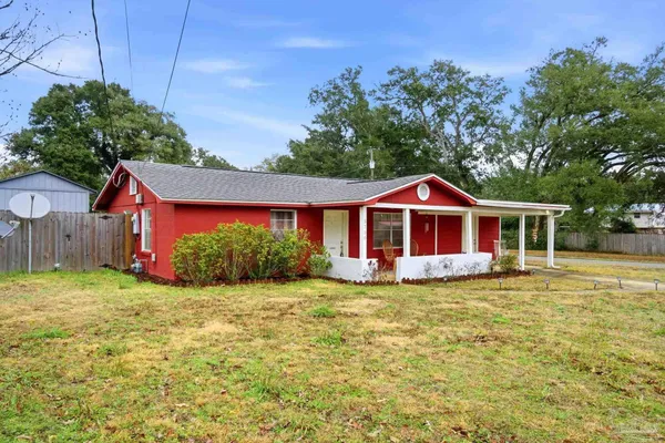 a front view of a house with yard