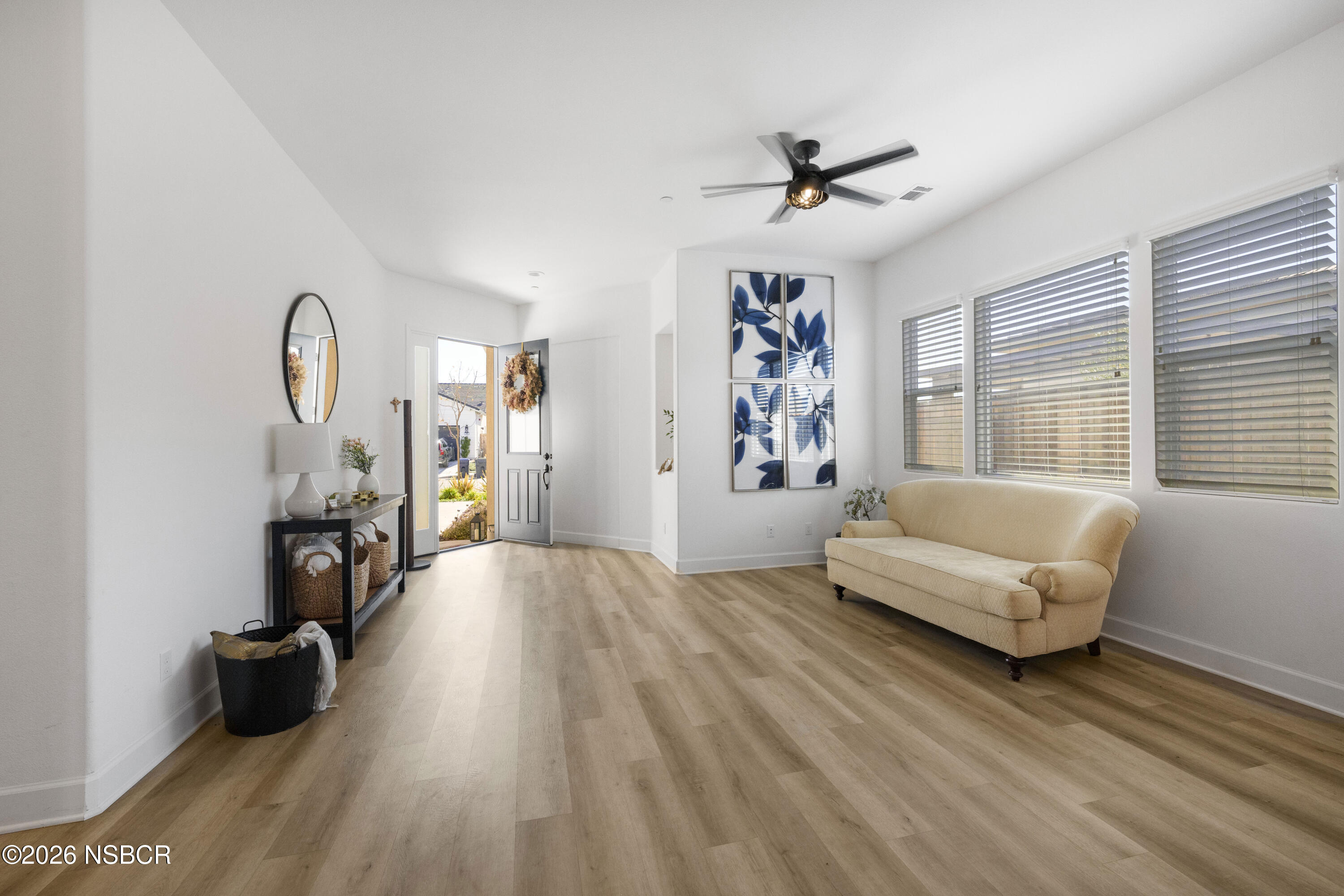 751 Skyview Lane Santa Maria, CA 93455 - Photo 11 of 31 a living room with furniture and a wooden floor
