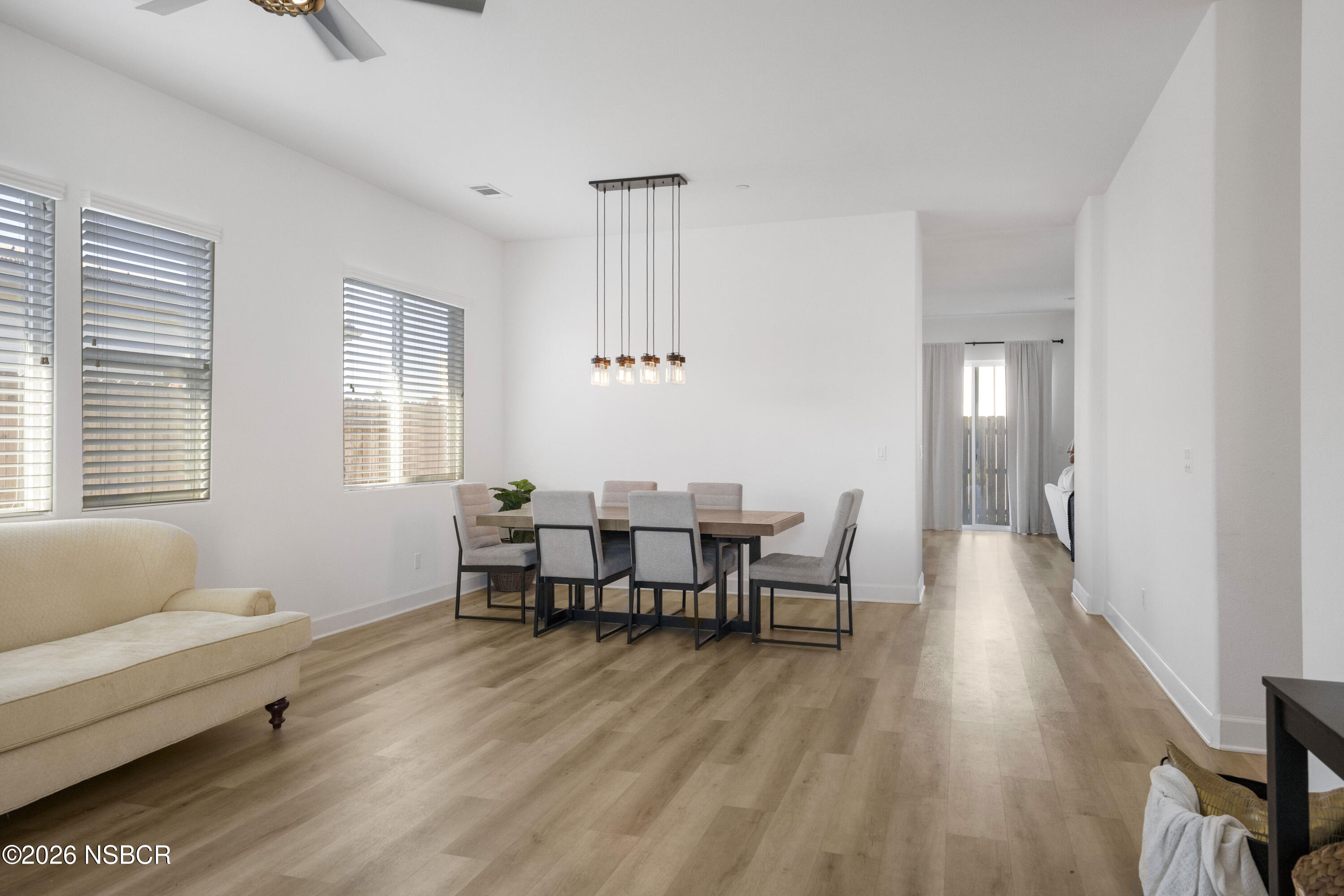 751 Skyview Lane Santa Maria, CA 93455 - Photo 12 of 31 a view of a dining room with furniture and wooden floor