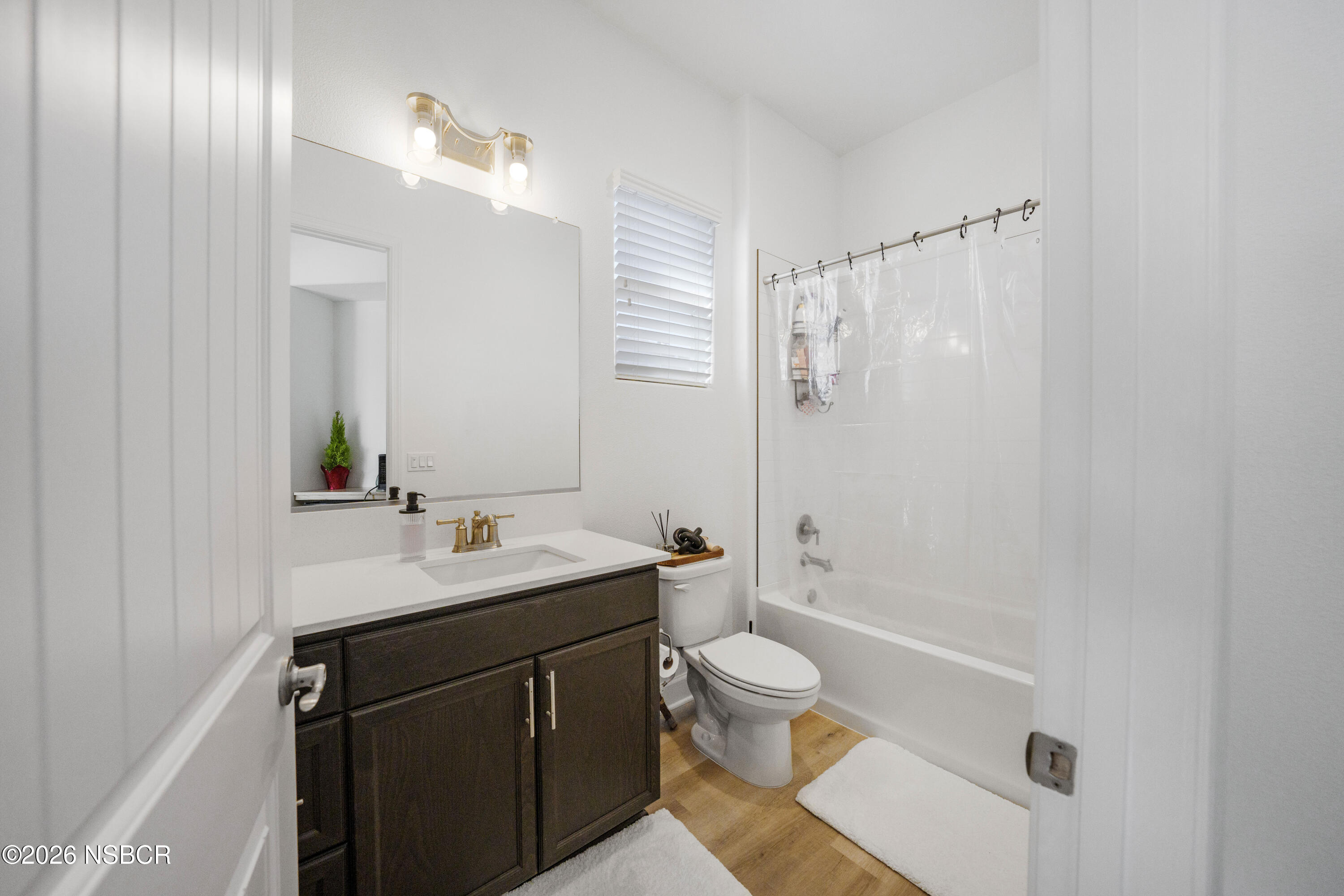 751 Skyview Lane Santa Maria, CA 93455 - Photo 18 of 31 a bathroom with a sink a toilet and shower