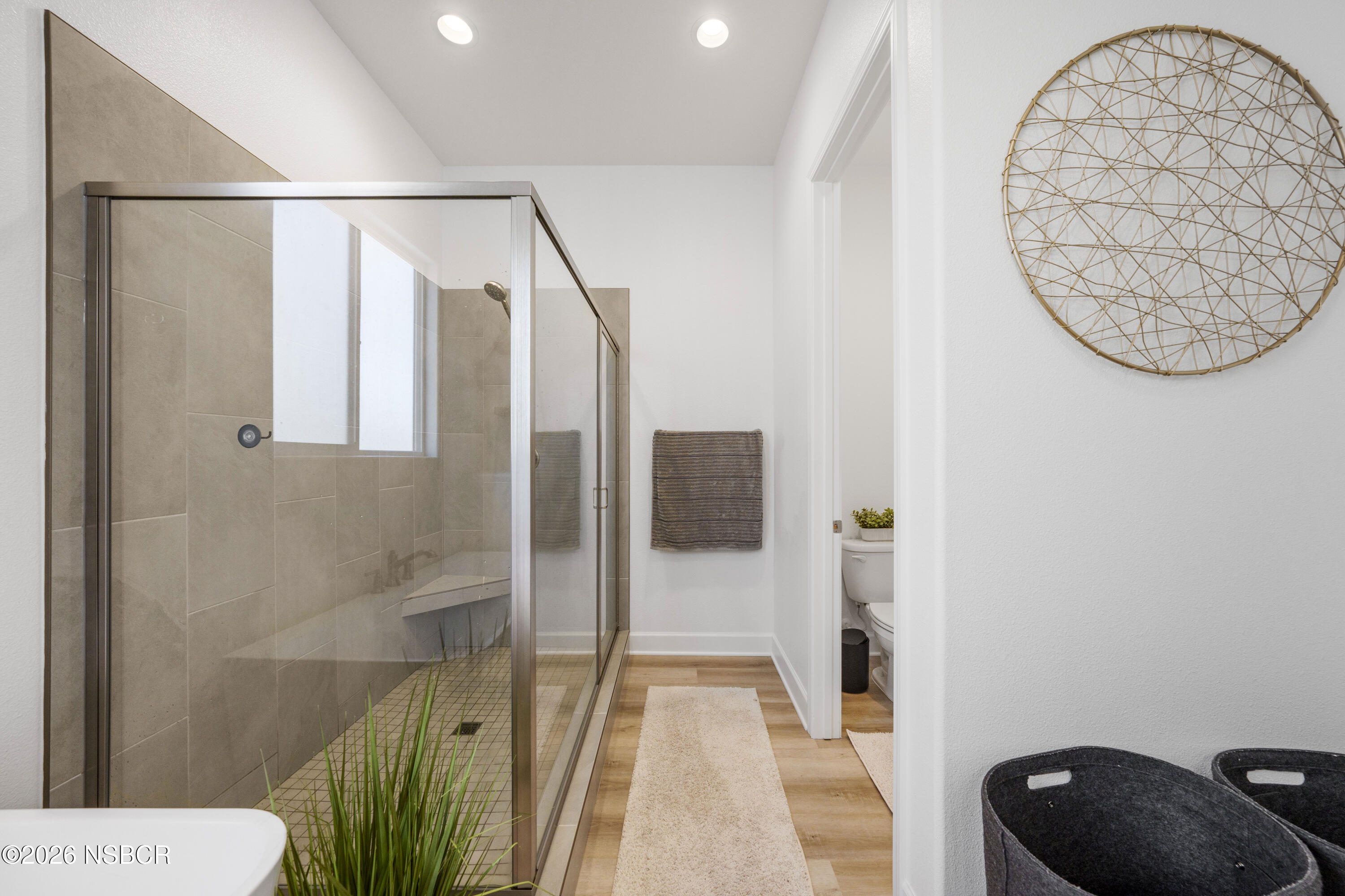 751 Skyview Lane Santa Maria, CA 93455 - Photo 25 of 31 a bathroom with a shower and a toilet
