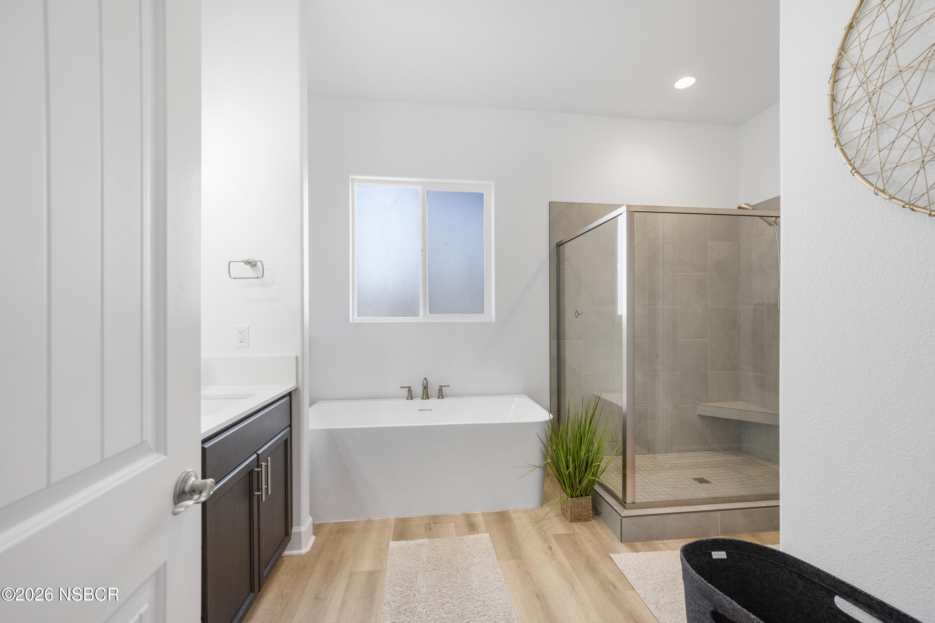 751 Skyview Lane Santa Maria, CA 93455 - Photo 26 of 31 a bathroom with a bathtub and a shower
