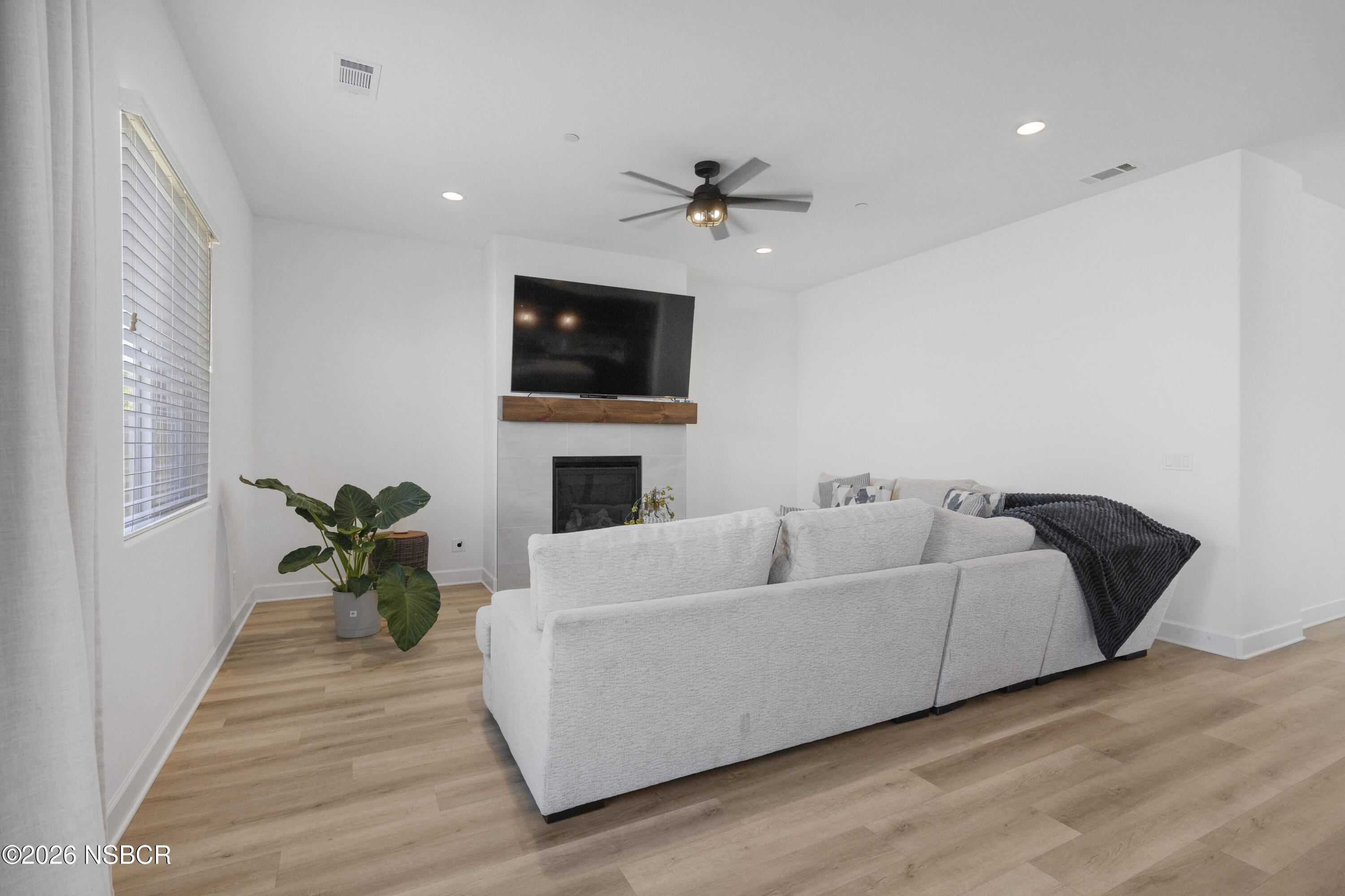 751 Skyview Lane Santa Maria, CA 93455 - Photo 5 of 31 a living room with furniture and a flat screen tv
