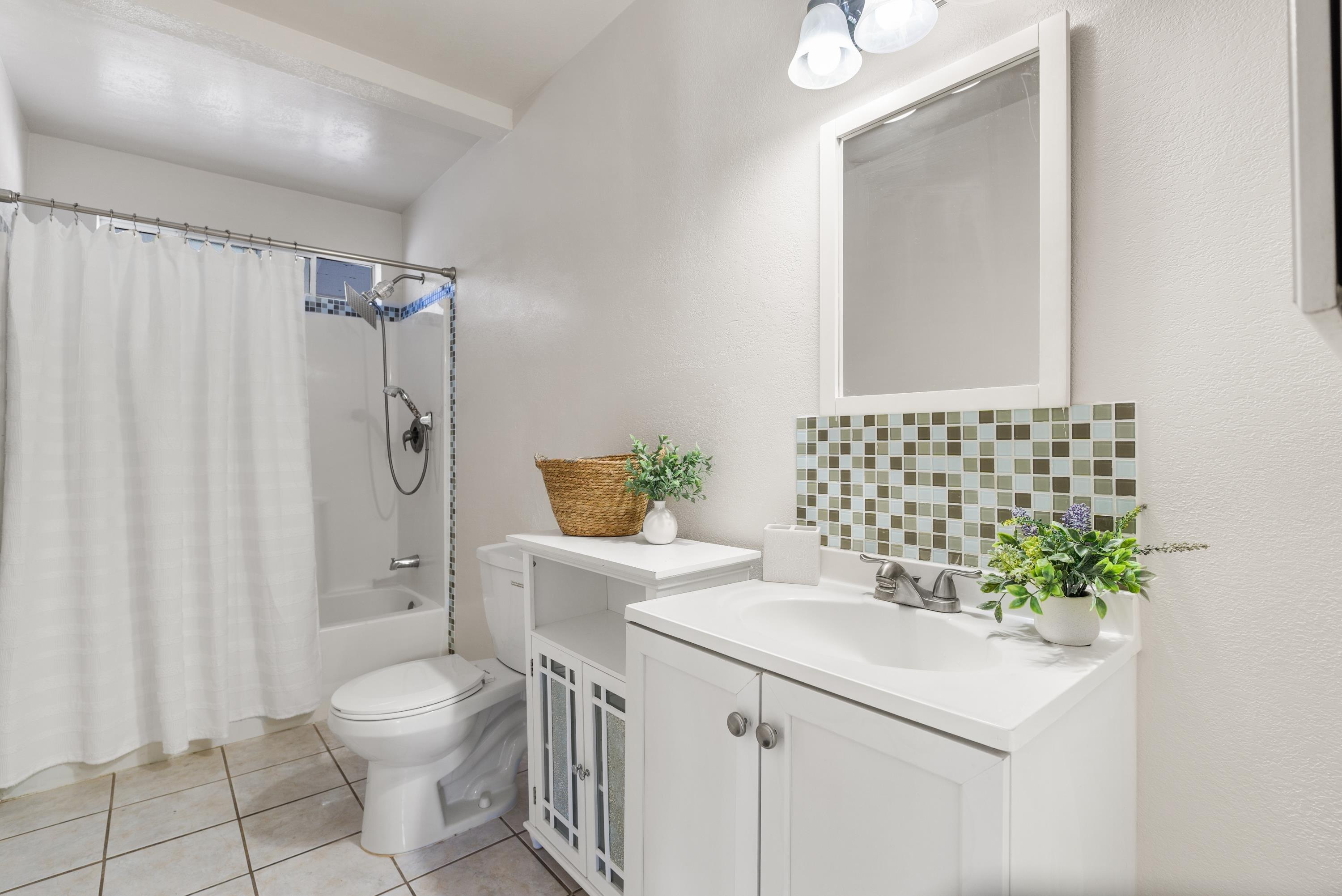 3316 Rucker Road Lompoc, CA 93436 - Photo 17 of 24 a bathroom with a sink toilet and shower